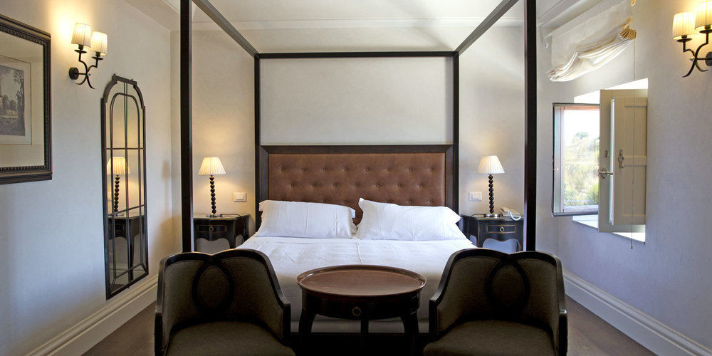 Villa Athena Resort Agrigento Bagian luar foto A bedroom at the Hotel